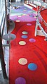 Photo of the lobby carpet design called Agua Corriente, looking down from the third floor.