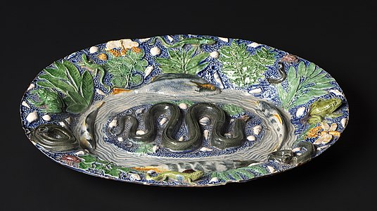 Bassin « rustique », attribué à Bernard Palissy. Fin du XVIe début du XVIIe siècle. Terre vernissée, moulages sur nature, glaçures plombifères. Paris, musée du Louvre.