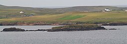 View of the islet from Sandness with Papa Stour in the background