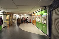 Ticket barriers and shops at the mezzanine