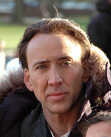 Nicolas Cage wearing a fur coat in 2006