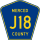 County Road J18 marker