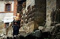 Water buffalo dung drying on the wall of a house in Yuanyang County, Yunnan, China