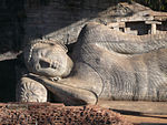 Upper part of a reclining Buddha.