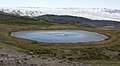 Kettle in Isunngua, a round, shallow glacial lake with no outflow