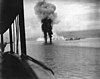 Smoke rises from two Japanese aircraft shot down off Guadalcanal