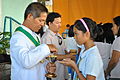 Students receiving Holy Communion during Holy Eucharist