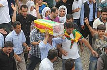 Photograph of a funeral procession for a baby killed in the Şırnak clashes