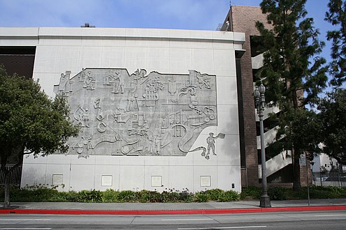 Relief sculpture Evolution of Printing by Tony Sheets on the Los Angeles Times parking garage at 213 S. Spring St., adjacent to Times Mirror Square on the south.