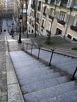 A photo taken from the top of the staircase, looking down it