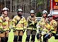Raleigh firefighters at a high school demonstration