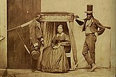 Dame brésilienne se faisant transporter en chaise à porteurs par ses esclaves (région de São Paulo, vers 1860).