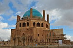 Octagonal building with turquoise dome.