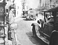 Image 22A Tokyo taxi driver indicating a fare of 50 Sen by holding up five fingers, in 1932 (from Transport in Greater Tokyo)