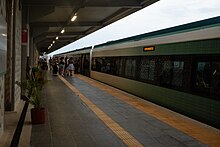 Passengers boarding the Tren Maya at Valladolid station, Yucatan, Mexico.