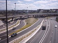 The Central Motorway Junction (CMJ) (also called 'Spaghetti Junction') in Auckland City, New Zealand, as seen from the Upper Queen Street bridge.