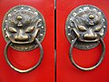 Image 44A traditional red Chinese door with Imperial guardian lion knocker (from Chinese culture)