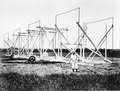 Karl Jansky and his rotating directional radio antenna (1932) in Holmdel, New Jersey, which was the world's first radio telescope, discovering radio emissions from the Milky Way.