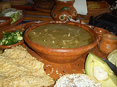 Green pozole, with condiments, served in Zihuatanejo (Guerrero)