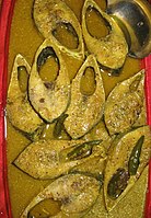 Sorshe Ilish, a dish of smoked ilish with mustard-seed paste, has been an important part of both Bangladeshi and Bengali cuisine.