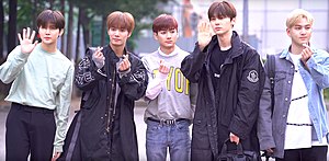 NU'EST in May 2019 From left to right: Ren, JR, Aron, Minhyun, and Baekho