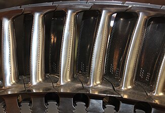Turbine blades with sealing shroud at tip with knife edge fins which are part of the labyrinth sealing arrangement with open honeycomb shrouds on the turbine casing.[119] The platforms at the base of the airfoil stops hot gas leakage which would overheat the turbine discs.
