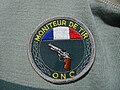 Écusson de poitrine de Moniteur de tir de l'ONC en 2003.