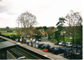 A picture of King' s Sutton station in 2010. King's Sutton station was upgraded, got a new shelter and re-gained it's footbridge‎ in 2009.