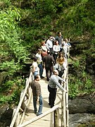 The wooden bridge in front of Smolare Falls