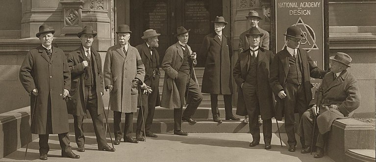 Council of the National Academy of Design, New York, April, 1922; Watrous is third from left, wearing an armband to mark that he is in mourning for his wife, Elizabeth, who died Oct. 4, 1921. Robert Ingersoll Aitken, designer or the Elizabeth Watrous Medal for Sculpture, is at center, hand in pocket. To identify others in the photo, see this image.