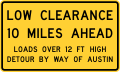 W12-4T Low clearance 10 miles ahead