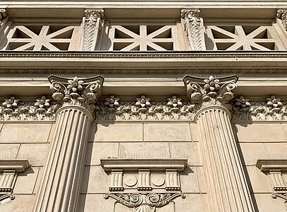 Oversized Neoclassical fleurons on the Romanian Atheneum, Bucharest, Romania, inspired by those of the Temple of Vesta in Tivoli, by Paul Louis Albert Galeron, 1888