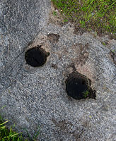 Mortar holes for pounding acorns into flour, Lost Lake, California