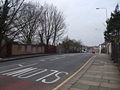 Looking west towards the bridge on Benton Road, similar to that on Wards Road but with pavements on both sides. The former route here was in a cutting.