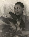 Image 9 Bessie Smith Photograph credit: Carl Van Vechten; restored by Adam Cuerden Bessie Smith (April 15, 1894 – September 26, 1937) was an American blues singer widely renowned during the Jazz Age. She is often regarded as one of the greatest singers of her era and was a major influence on fellow blues singers, as well as jazz vocalists. Born in Chattanooga, Tennessee, her parents died when Smith was young, and she and her sister survived by performing on the streets of Chattanooga, Tennessee. She began touring and performed in a group that included Ma Rainey, and then went out on her own. Her successful recording career began in the 1920s, until an automobile accident ended her life at age 43. More selected pictures