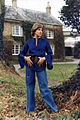 Image 63English girl in the mid-1970s wearing a wide-sleeved shirt, belted at the waist. (from 1970s in fashion)