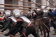 First rank holding pikes at charge for horse defensive posture and second rank at charge for delivering thrusts