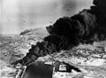 Image 3Smoke rises from oil tanks beside the Suez Canal hit during the initial Anglo-French assault on Egypt, 5 November 1956. (from Egypt)