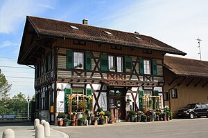 Two-story building with gabled roof