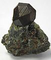 Image 14Black andradite, an end-member of the orthosilicate garnet group. (from Mineral)