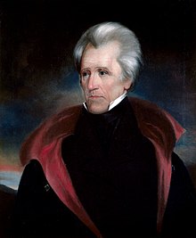 White-haired man with black coat