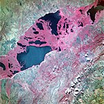 Satellite image, false colour, of a lake in a depression