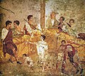Image 20A multigenerational banquet depicted on a wall painting from Pompeii (1st century AD) (from Roman Empire)