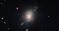 ESO 486-21 is a spiral galaxy with a somewhat irregular and ill-defined structure.[11]