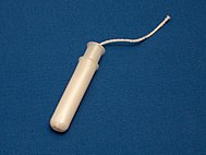 Tampon in plastic applicator