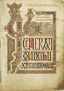 Folio 27r from the Lindisfarne Gospels (c. 700) contains the incipit from the Gospel of Matthew.