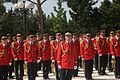 Musicians of the band in their scarlet uniform.
