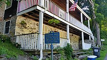 a picture of the marker with the house in the background