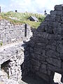 Saint Caomhan's church with Caomhan's grave (Leaba Caomhan) in the background.