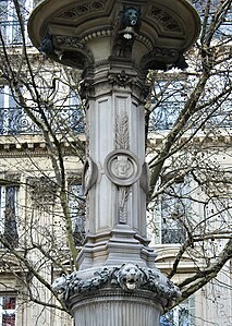 Neoclassical fleuron on the capital of a Corinthian pilaster of the Fontaines du Théâtre-Français, Paris, designed by Gabriel Davioud and sculpted by François Théophile Murgey,[4] 1867-1874